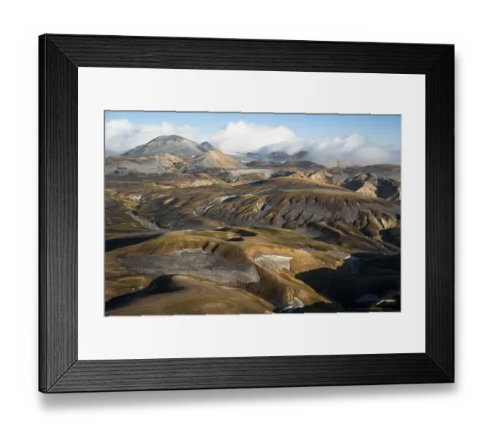 Framed Print : Aerial view, rhyolite mountains covered in snow and ashes