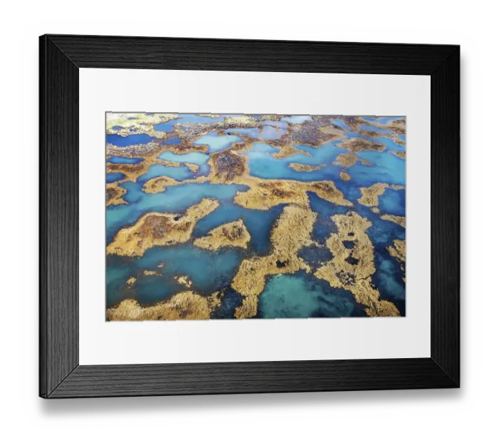 Framed Print : Multicolored labyrinth between rocks in the water from different minerals and underground springs