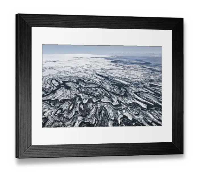 Framed Print : Aerial view, structures of volcanic ash and black lava in the ice and snow of the Vatnajoekull glacier