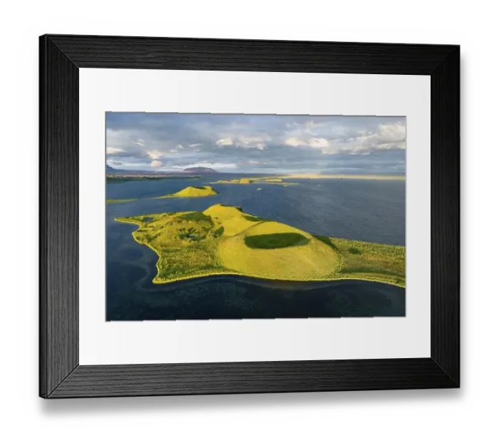 Framed Print : Aerial view of green volcanic island