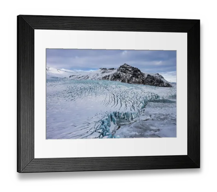 Framed Print : Snow-covered icebergs in the Fjallsarlon glacier lagoon