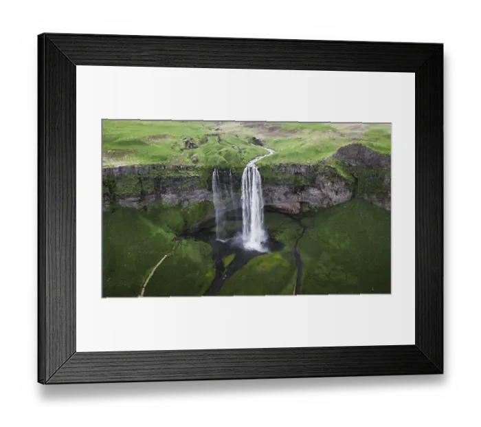 Framed Print : Aerial view, Seljalandsfoss waterfall falls from high cliff Framed Print : Aerial view, Seljalandsfoss waterfall falls from high cliff
