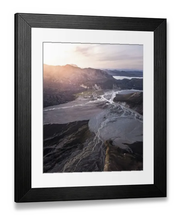Framed Print : Aerial view, volcanic barren mountain landscape with river course Framed Print : Aerial view, volcanic barren mountain landscape with river course