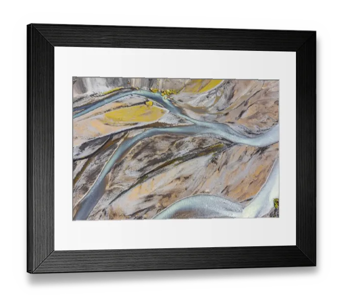 Framed Print : Blue river arms flowing through lava sand Framed Print : Blue river arms flowing through lava sand
