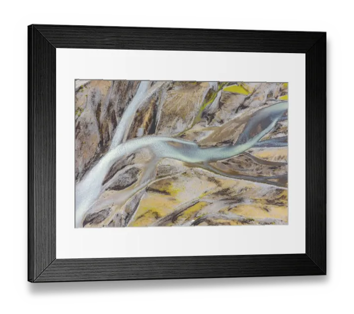 Framed Print : Blue river arms flowing through lava sand Framed Print : Blue river arms flowing through lava sand