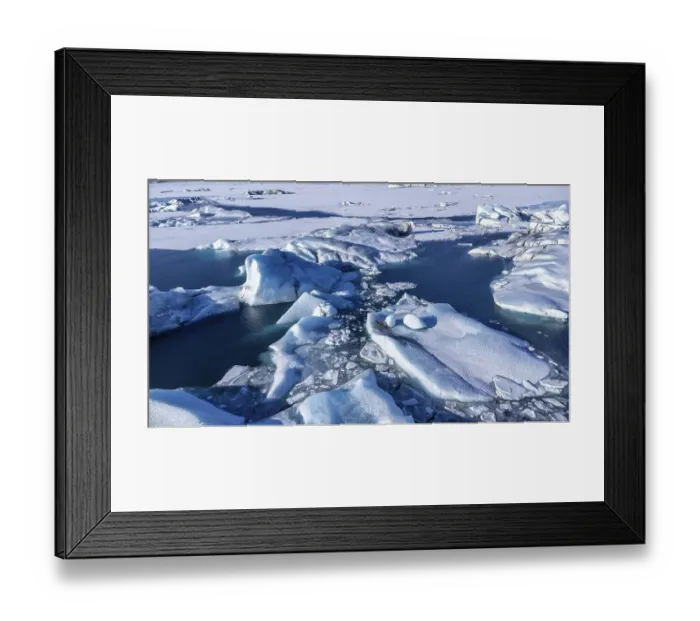 Framed Print : Aerial drone view of floating icebergs in Jokulsarlon glacier lagoon in Iceland