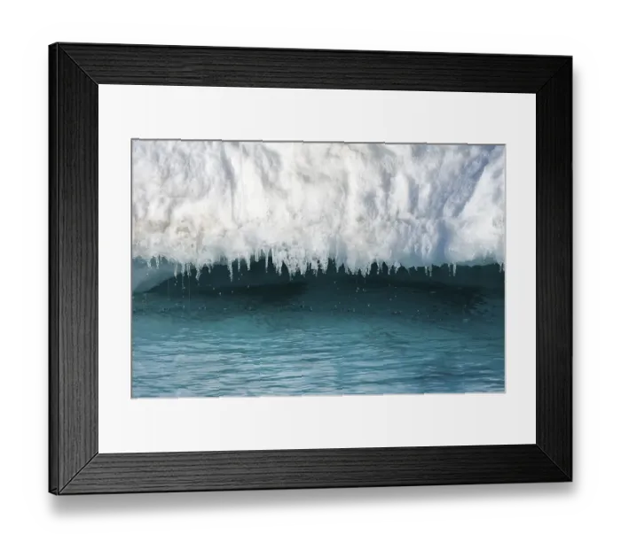 Framed Print : Waterdrops dripping from ice stalactites