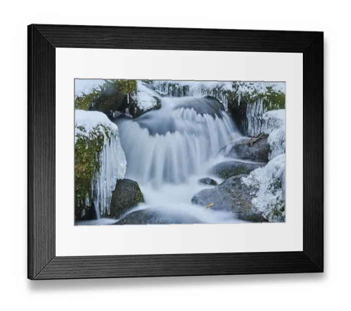 Framed Print : Icicles on wild river in nature reserve Hoelle