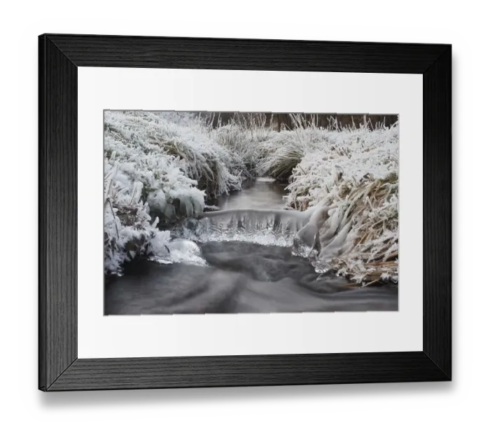 Framed Print : Winter landscape by a stream, hoarfrost and icicles