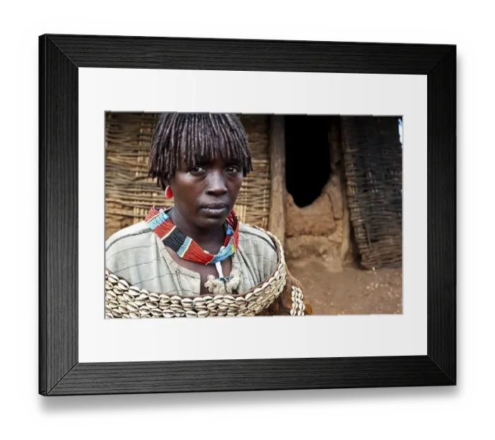 Framed Print : Banna tribe woman, hut, Omo valley