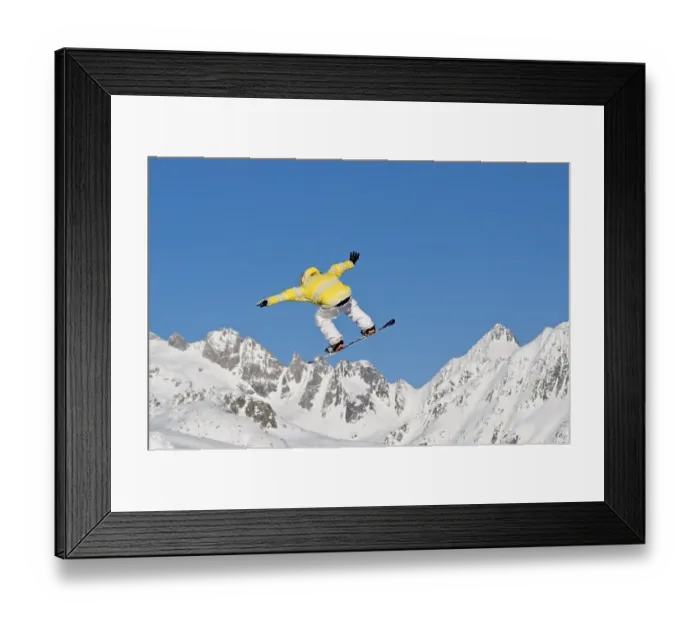 Framed Print : Skier jumping, against blue sky Framed Print : Skier jumping, against blue sky