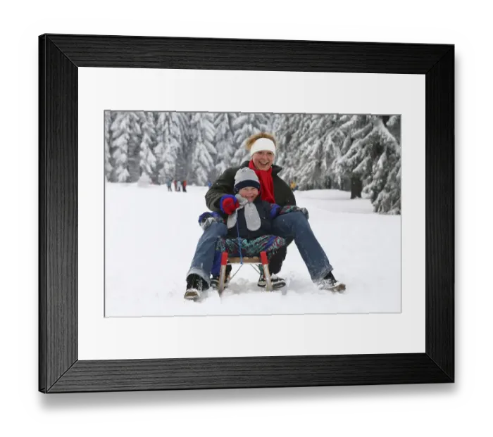 Framed Print : Mother and boy, four years, sledging