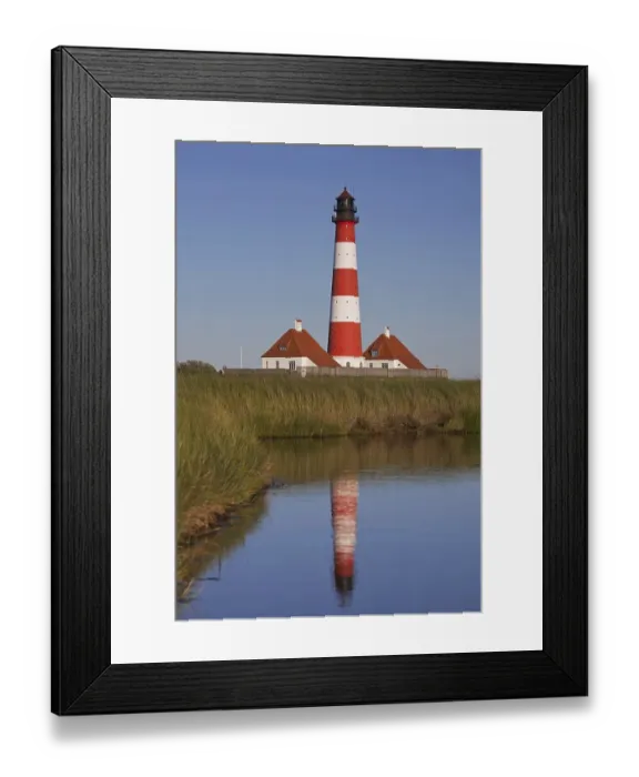 Framed Print : Lighthouse Westerheversand at Westerhever on the Eiderstedt Peninsula Framed Print : Lighthouse Westerheversand at Westerhever on the Eiderstedt Peninsula