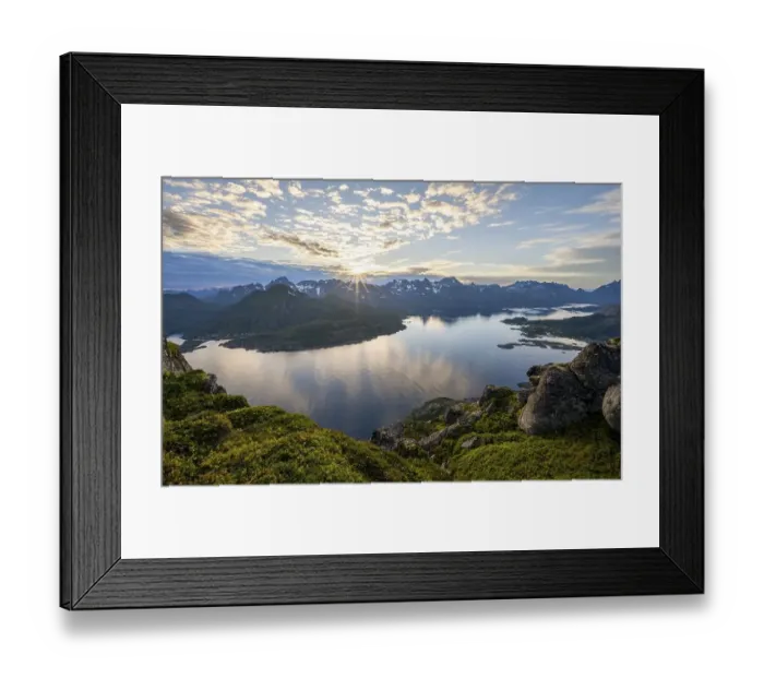 Framed Print : Sun star at sunset over the mountain peaks