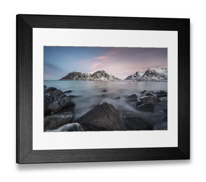 Framed Print : Rocky coast, mountains in the background