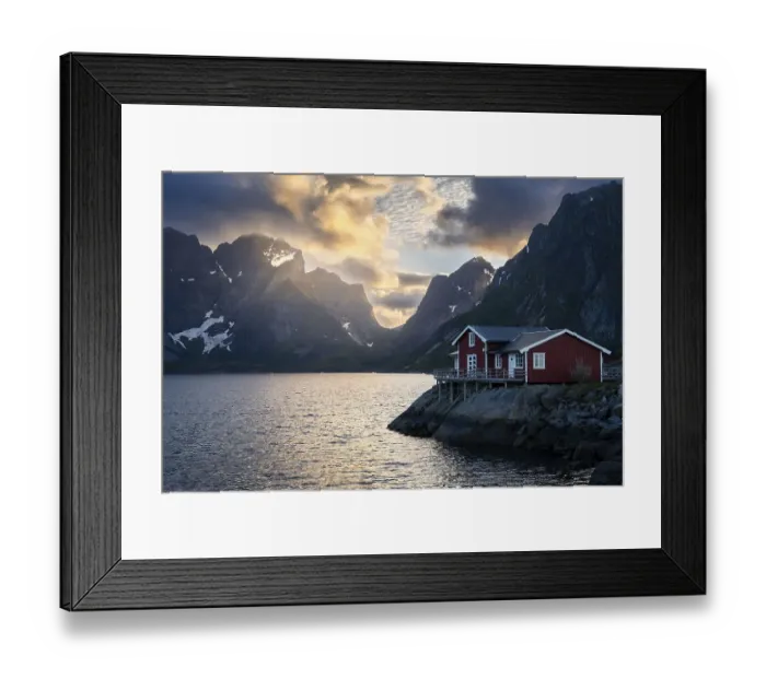 Framed Print : A typical red wooden house on wooden stilts (rorbuer) in the small village of Toppoya (Toppoy)
