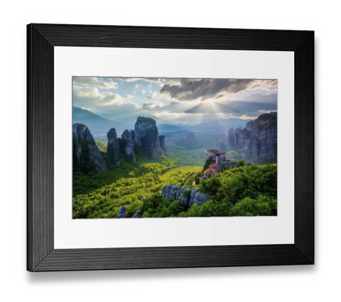 Framed Print : View with sunset with sun rays over the monastery of Rousanou and the monastery of St