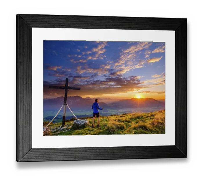 Framed Print : Mountaineers at the Schlenken summit cross at sunset clouds (cumulus)