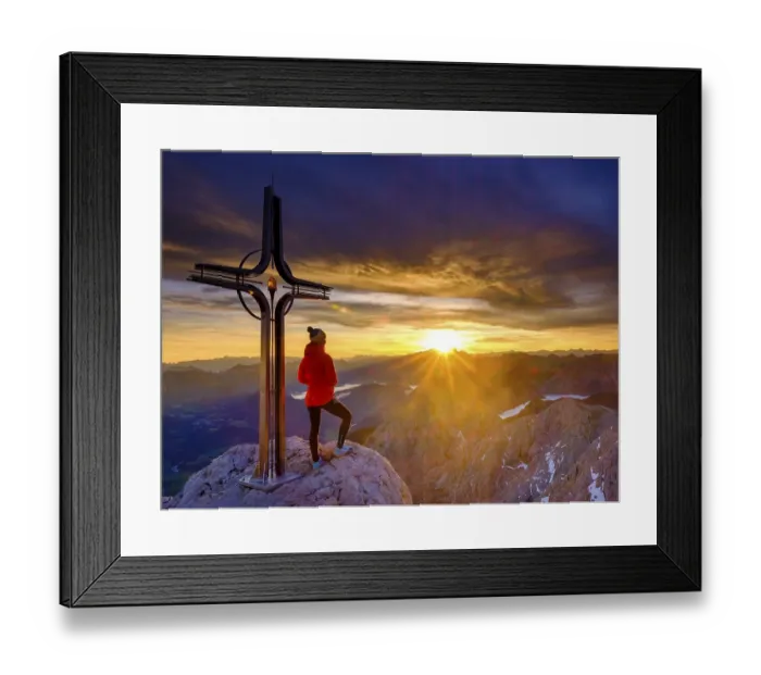 Framed Print : Mountaineer at the summit cross Hohe Goell at sunrise