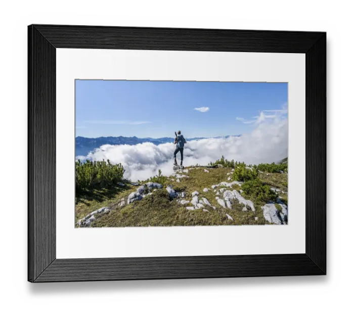 Framed Print : Hiker above the clouds, looking into the distance Framed Print : Hiker above the clouds, looking into the distance