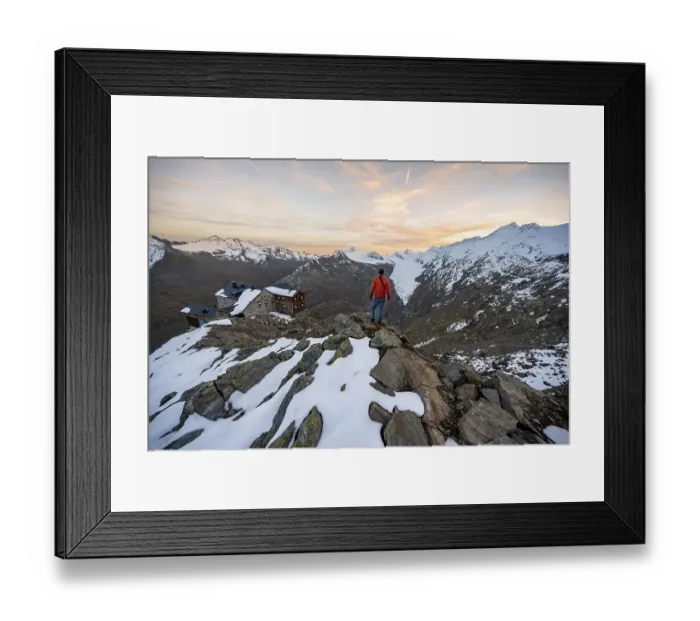 Framed Print : Hiker looking at mountain panorama and glacier