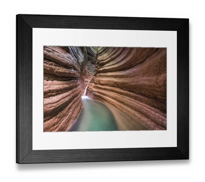 Framed Print : The Taugl river flowing through a red gorge