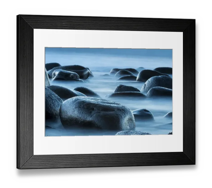 Framed Print : Round stones in the surf, beach of Utakleiv
