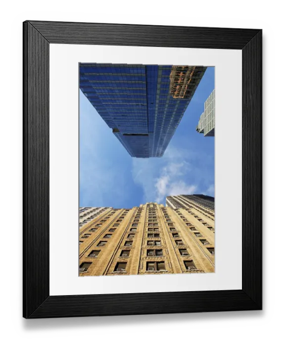 Framed Print : Skyscraper against blue sky, New York City Framed Print : Skyscraper against blue sky, New York City