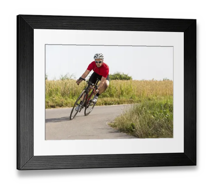 Framed Print : Cyclist, 44 years, riding a racing cycle