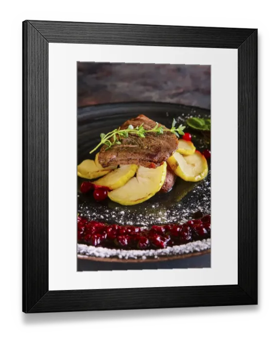 Framed Print : Closeup view of duck breast with apple and currant sauce Framed Print : Closeup view of duck breast with apple and currant sauce