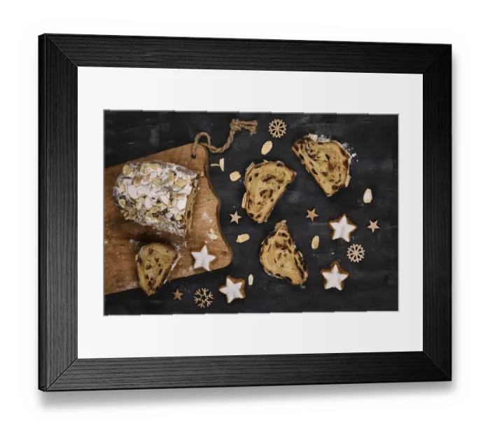 Framed Print : Slice of German Stollen cake, a fruit bread with nuts
