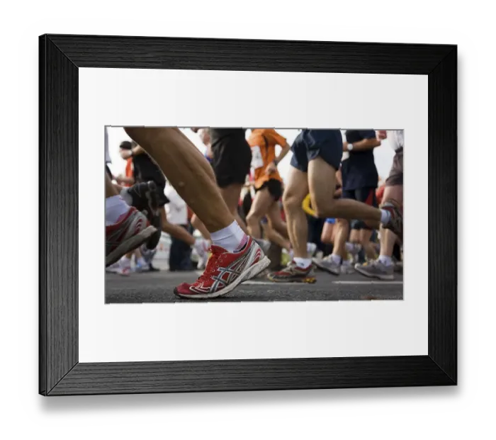 Framed Print : Detailed view of the legs and feet of the runners of the Marathon 2008 Framed Print : Detailed view of the legs and feet of the runners of the Marathon 2008