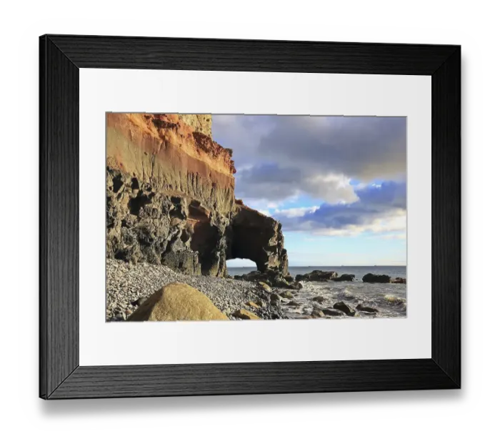 Framed Print : Lonely beach with a natural stone arch on the Atlantic Ocean in the Canary Islands Framed Print : Lonely beach with a natural stone arch on the Atlantic Ocean in the Canary Islands