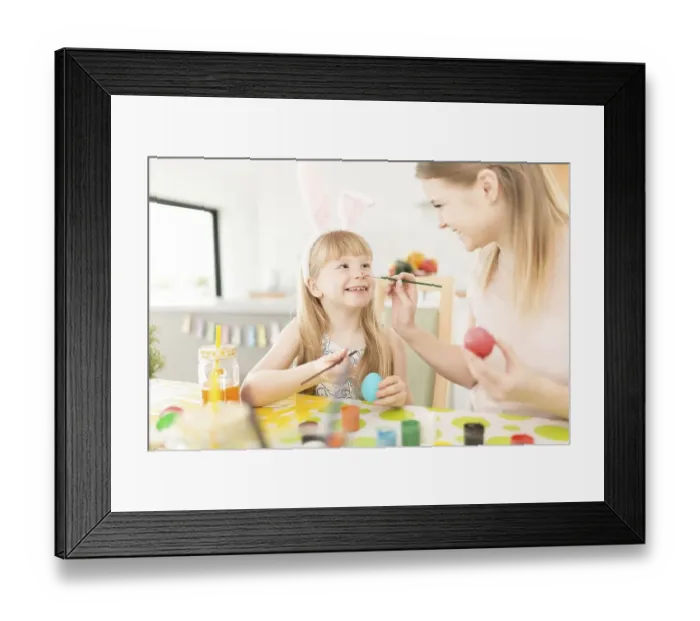 Framed Print : Playful woman with daughter preparing easter