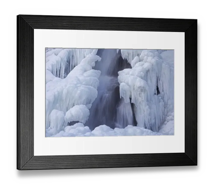 Framed Print : Bora del Nivolet, ice formations and icicles on waterfall of frozen river in winter
