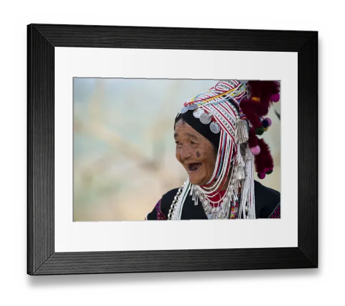 Framed Print : Smiling woman with headdress of the Akha hill tribe Framed Print : Smiling woman with headdress of the Akha hill tribe