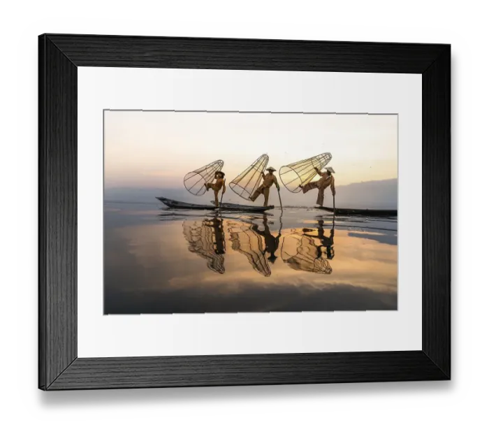 Framed Print : Three traditional fishermen pose standing on their small boats Framed Print : Three traditional fishermen pose standing on their small boats