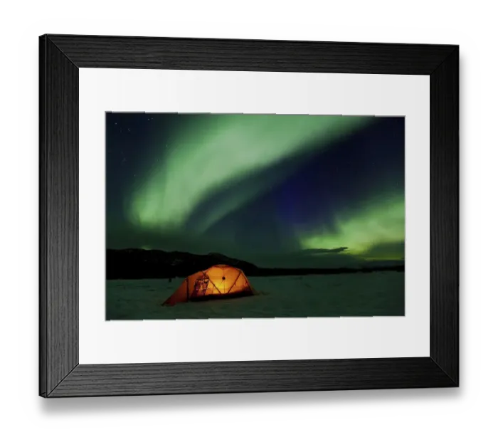 Framed Print : Illuminated expedition tent and traditional wooden snow shoes Framed Print : Illuminated expedition tent and traditional wooden snow shoes