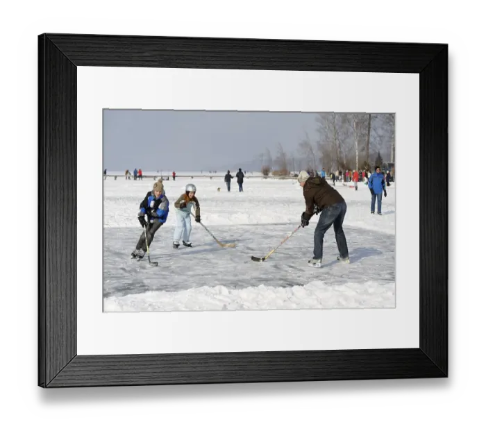 Framed Print : Ice skaters and hikers at the little house on the lake