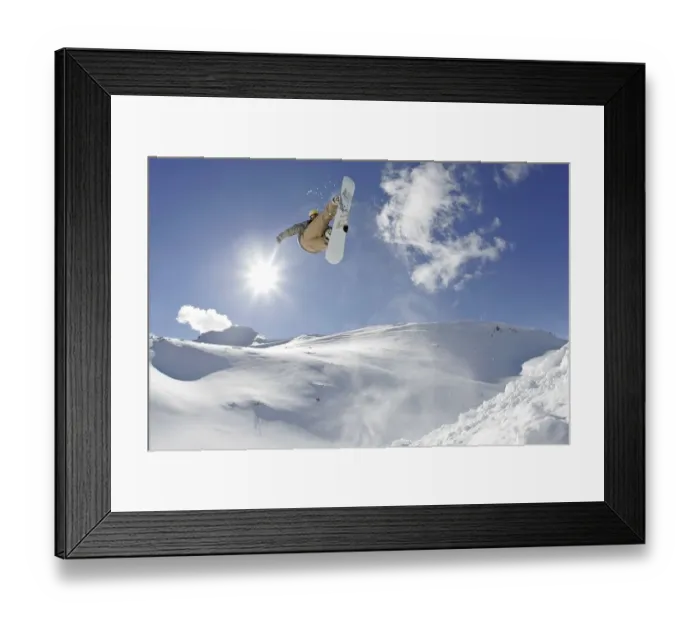 Framed Print : Snowboarder jumping out of Quarterpipe