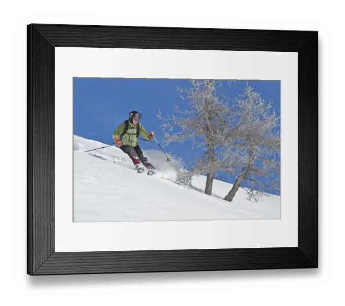 Framed Print : Skier in deep snow
