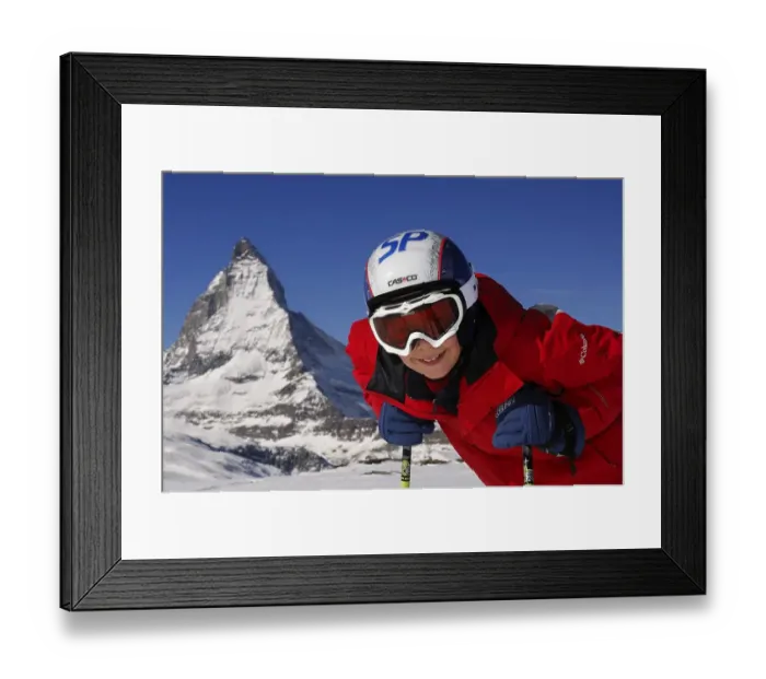 Framed Print : Child Skier in front of the Matterhorn in Zermatt Framed Print : Child Skier in front of the Matterhorn in Zermatt