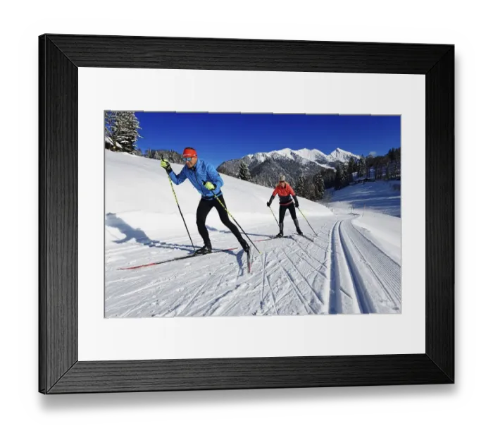 Framed Print : Olympic silver medalist Tobi Angerer with his wife Romy on the cross-country ski trail of Winklmoos-Alm