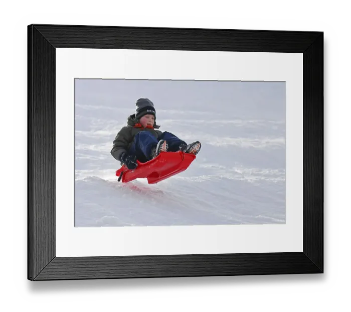 Framed Print : Boy tobogganing, tobogganing, Lower Saxony Framed Print : Boy tobogganing, tobogganing, Lower Saxony