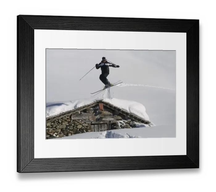 Framed Print : Skiers jumping on the Wildkogel