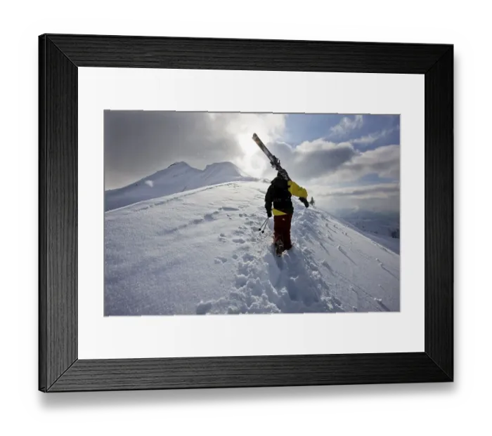 Framed Print : Skier on the way to the ski-run
