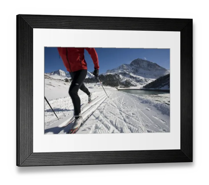 Framed Print : Cross-country skier, right the Laengental Reservoir