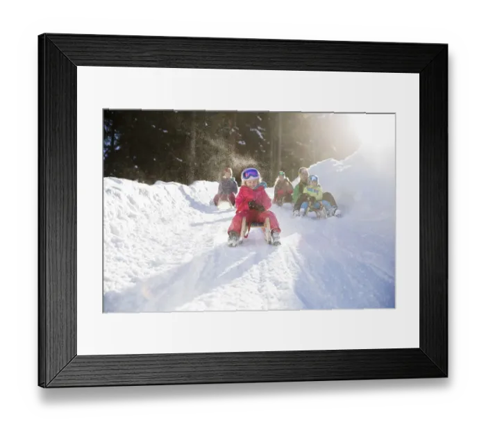 Framed Print : Girls, children riding sledges with their family Framed Print : Girls, children riding sledges with their family