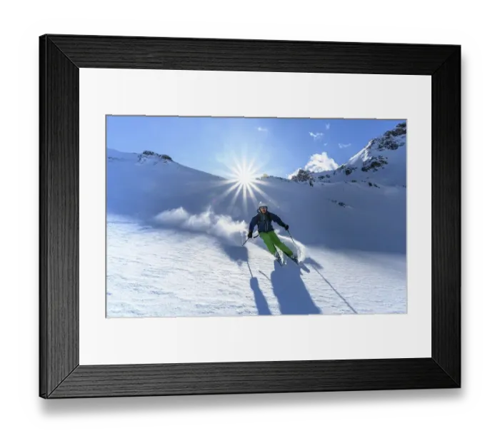 Framed Print : Skier with touring skis skiing in the snow