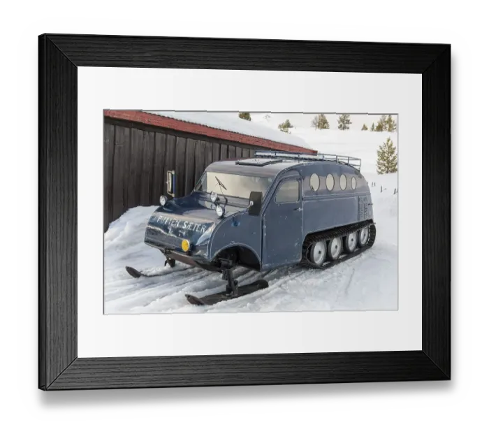 Framed Print : Oldtimer, Auto Neige, Bombardier snowmobile B12 with skis and chains in winter in the snow